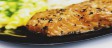 Łosoś z pieca w sosie cytrynowym, frytki, zestaw surówek – 25,00 zł
